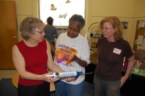 Councilor Henrietta Davis, CCC member Yvonee Gittens, and HEET leader Audrey Schulman